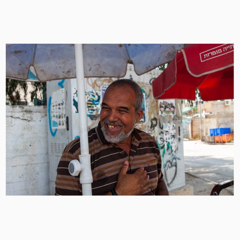 A man at juice stand in Jenin Camp